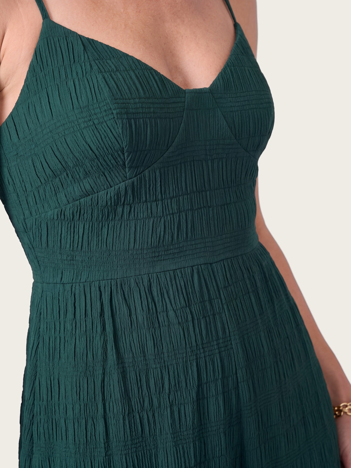 Florence jumpsuit side view showing fit and drape